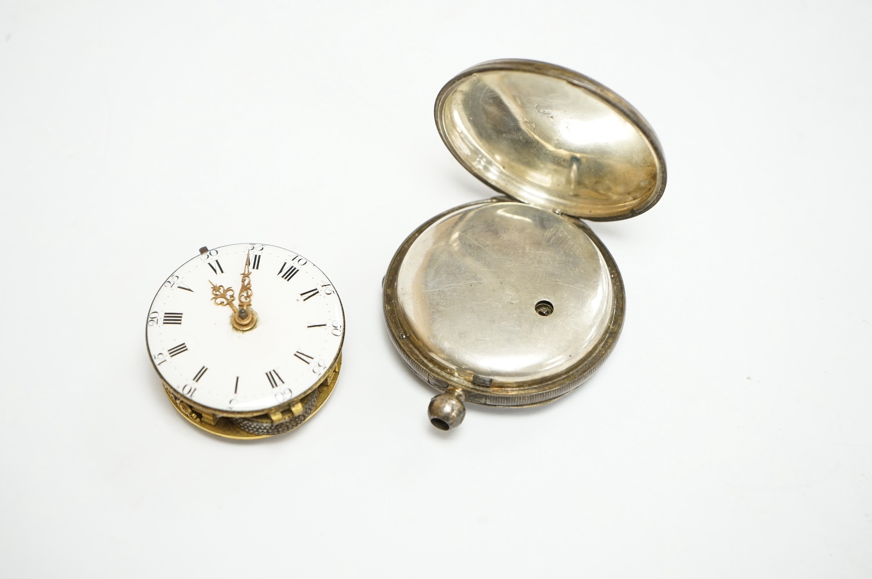 An 18th century pocket verge pocket watch movement, by Barton of Manchester, together with a silver open faced pocket watch. Condition - poor